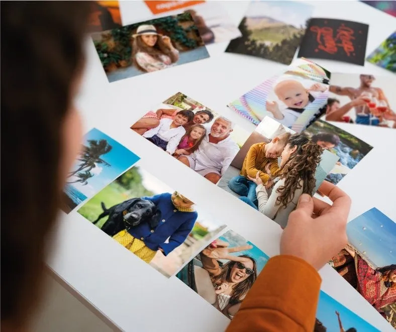 A spread of freshly developed photo prints