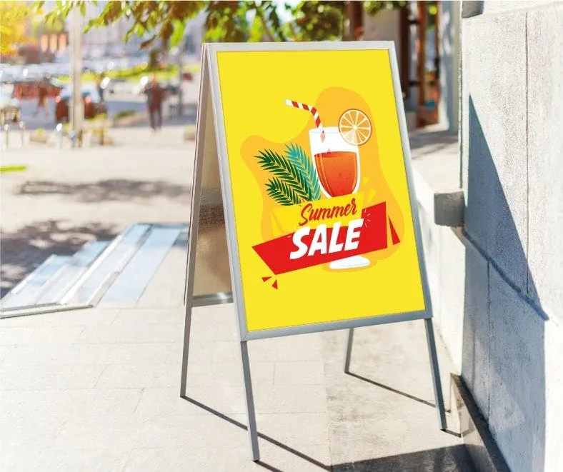 A printed pavement A board advertising a sale